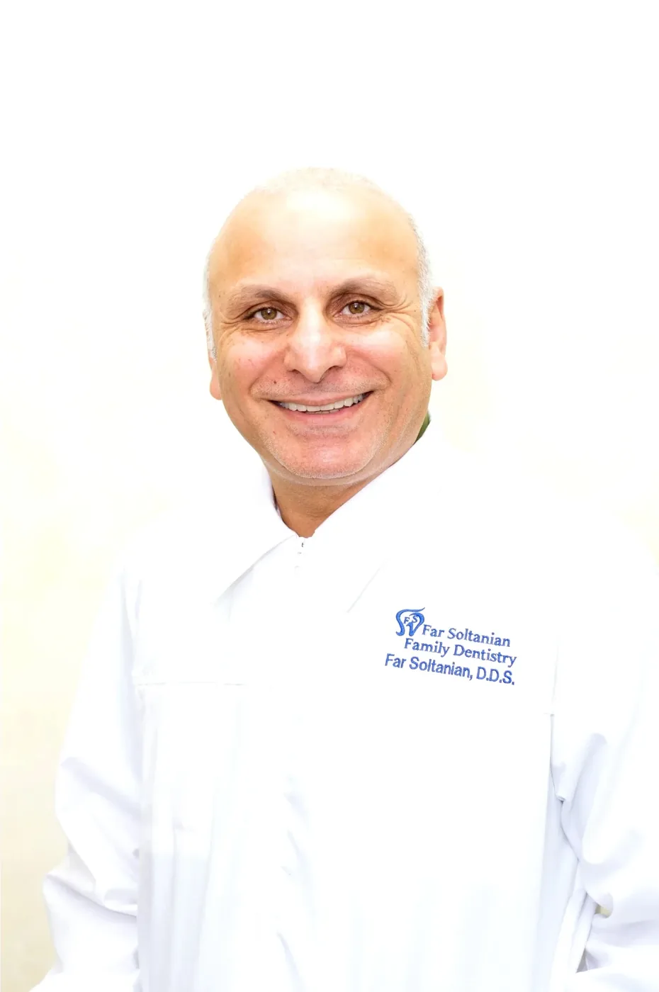 Dr. Far Soltanian, dentist at Smile NOVA Implant Center, in a white coat